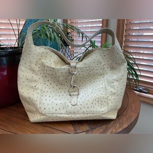 Dooney & Bourke ostrich leather sac handbag.